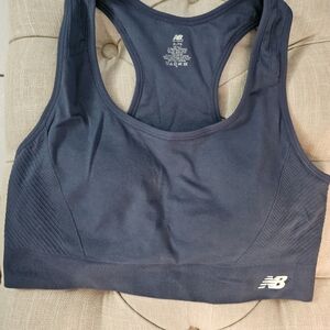 NEW BALANCE SPORTS BRA WITH CELL POCKET NEW WITH OUT TAGS! SIZE XL!